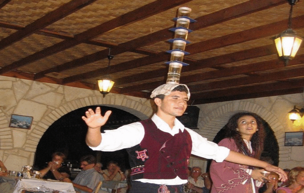 Dancing With Glasses On One's Head In Cyprus