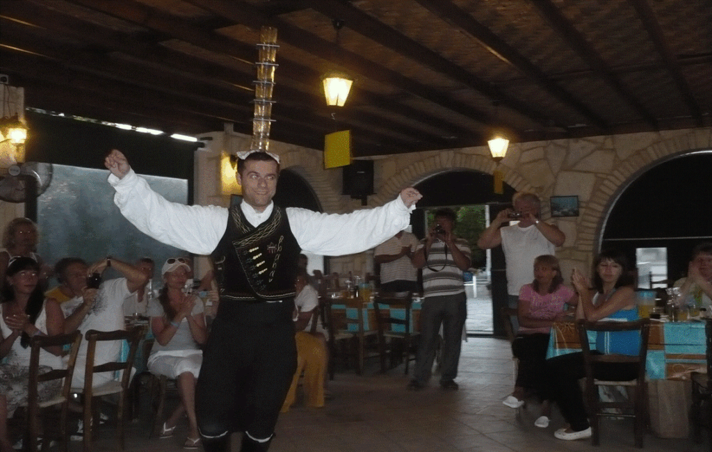 Dancing With Glasses On One's Head In Cyprus