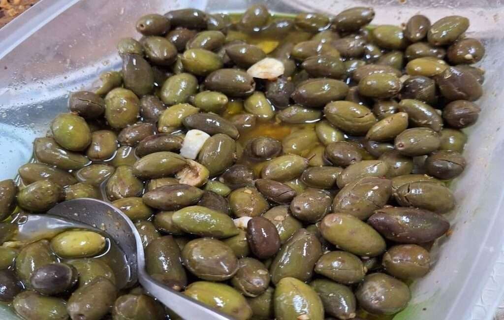 Cyprus olives Served With natural oils & A Twist Of Lemon & Garlic