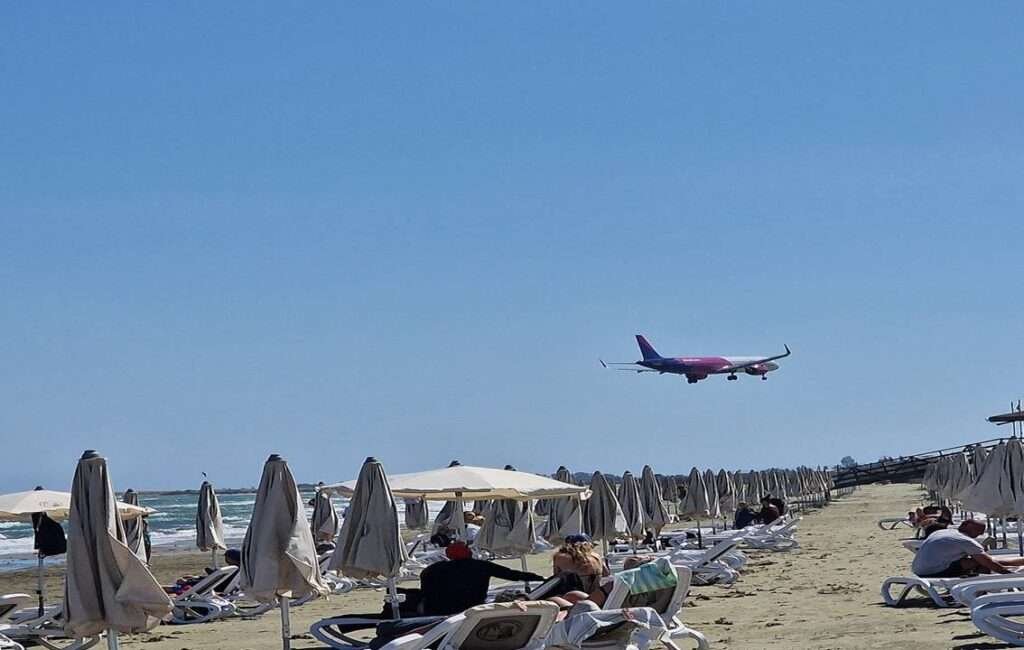 Spotting low-Flying Aircraft At Mackenzie Beach In Larnaca, Cyprus